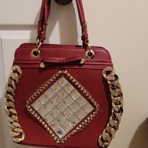 Purse - Red High-end Handbag with jewels, chain accents, & shoulder strap.